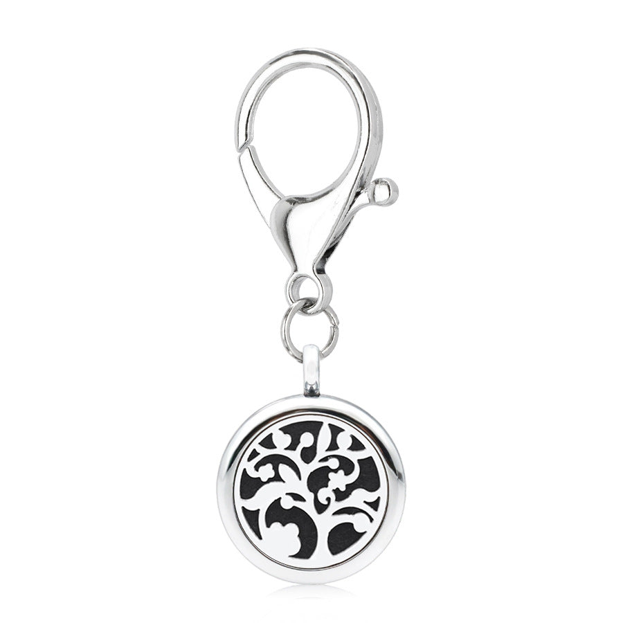 Wholesale Alloy 25MM Tree of Life Pink Ribbon Hollow Aromatherapy Essential Oil Keychain